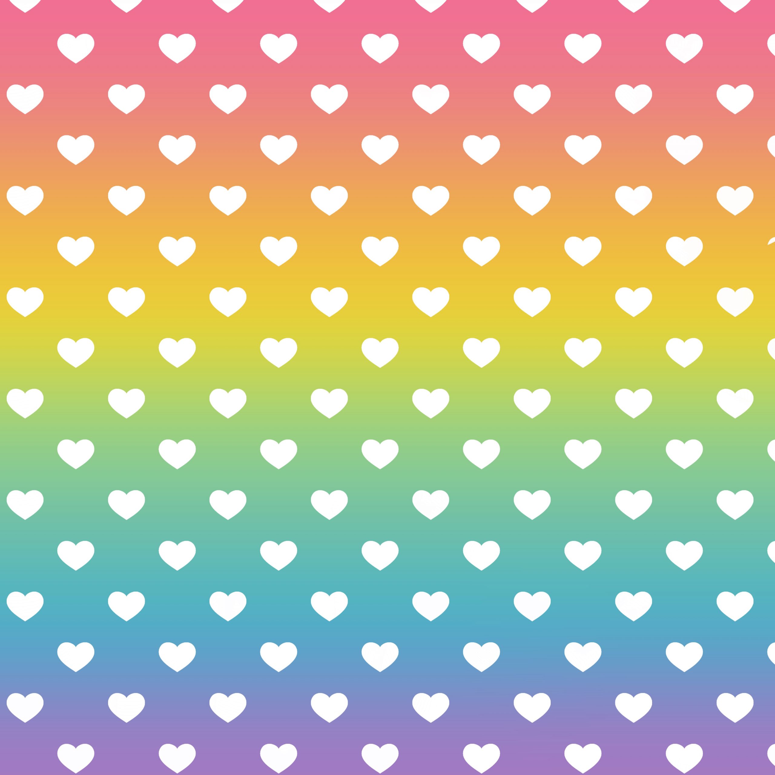 Patrón arcoiris y pequeños corazones blancos